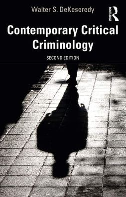 This is the book cover for contemporary critical criminology, 2nd edition. It has the shadow of a person on a brick pathway.
